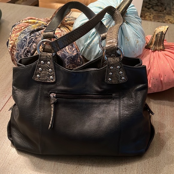 Black butter soft leather purse with grey snake handles and front pockets. - Picture 2 of 7